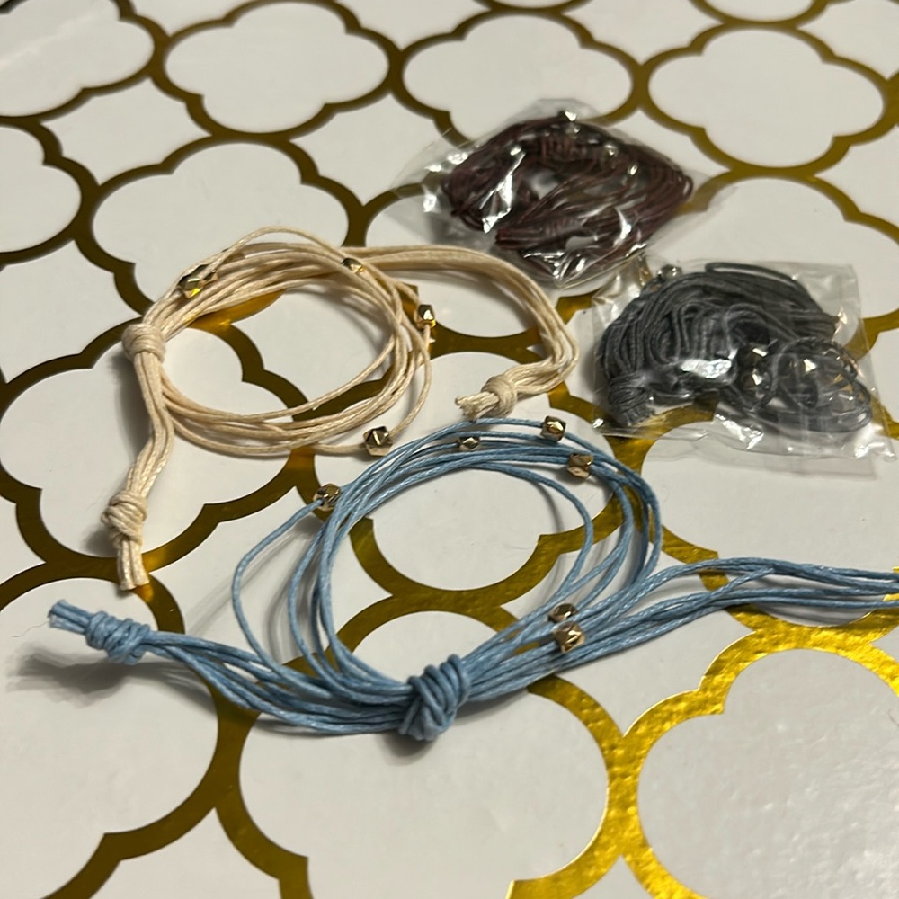 4 String bracelets with metal bead accents